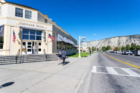 Wyoming, USA - Aug. 28, 2019: Visitors at the Mammoth Hot Springs Historic District in Yellowstone National Park. The area has statewide significance as the administrative and concession headquarters of the largest national park in Wyoming.のeditorial素材