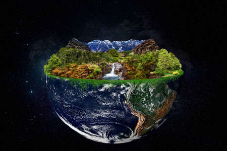 Planet earth with garden of Eden concept floating in space. Elements of this image used with permission from NASA imagery.の写真素材