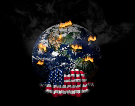 Hands painted with US flag holding stressed planet in crisis. Concept of United States role in climate crisis; natural disasters, global warming, apocalypse, war, judgment day.の写真素材