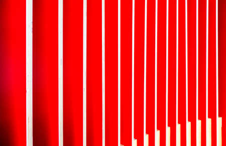 Abstract lines of building windows shot at an angle to create contrast and interesting geometric shape patterns for design background.の写真素材