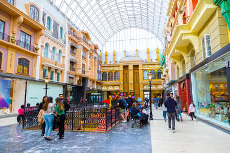 EDMONTON, CANADA - APRIL 16, 2022: Shoppers visit the West Edmonton Mall in Alberta, Canada. At 5.3 million sq ft, it is the second largest shopping mall in North America.のeditorial素材