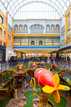 EDMONTON, CANADA - APRIL 16, 2022: Shoppers visit the West Edmonton Mall in Alberta, Canada. At 5.3 million sq ft, it is the second largest shopping mall in North America.のeditorial素材