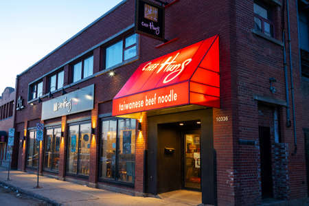 EDMONTON, CANADA - APRIL 17, 2022: Storefront of Chef Hung restaurant in Strathcona, Edmonton, Alberta. Since 2011, the famous Taiwanese beef noodle restaurant has expanded to the US, Canada and mainland China to continue its award-winning traditional nooのeditorial素材