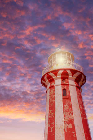 Historic Hornby Lighthouse at sunrise near Watsons Bay in Sydney Harbour National Park, NSW, Australia. The iconic red and white striped tower was built in 1858.の写真素材