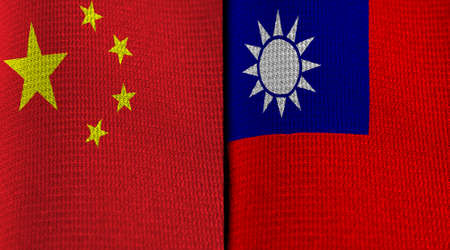 Flags of China and Taiwan on folded fabric. Concept of political relations and tension between the two entities.の写真素材