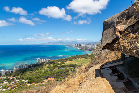 Close up of an old war bunker atop the famous Diamond Head Crater overlooking the Waikiki coastline in Oahu, Hawaii. The bunkers were built in the early 1900s as part of the area's coastal defense military system.の写真素材