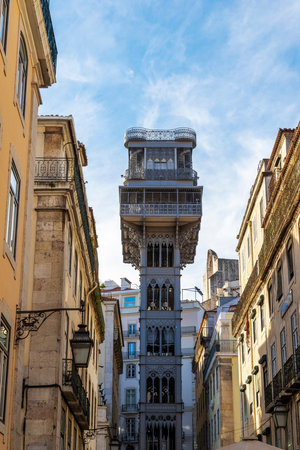Historic 19th century Elevador de Santa Justa, an elevator lift in the Baixa district of Lisbon, Portugal, was built to help residents navigate the city's steep hills. Inaugurated by King Carlos I in 1901, it was originally powered by steam engine.の写真素材