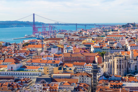 Skyline of Baixa, Chiado, Bairro Alto and Alcantara neighborhoods in Lisbon, Portugal, with views of...