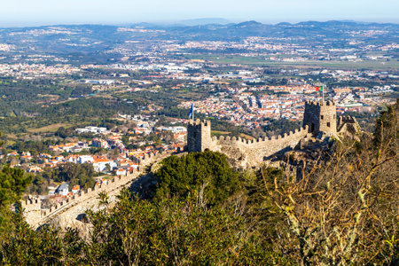 Castle of the Moors, or Moorish Castle, is a historic hilltop medieval castle overlooking the town of Sintra, Portugal. Built in the 8th century as a strategic defence of the Iberian Peninsula, it is a UNESCO World Heritage Site.の写真素材