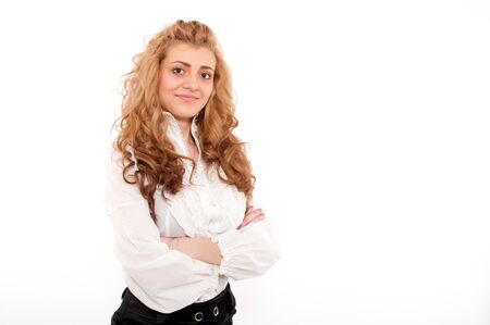 Young business woman with her arms crossedの写真素材