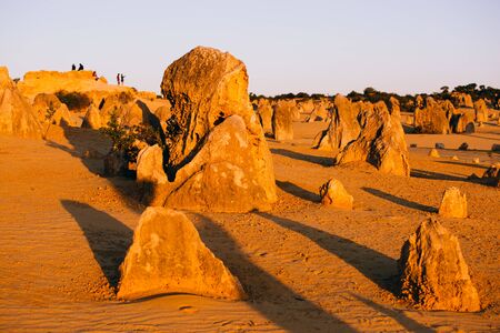 The Pinnacle Desert at sunset, limestone formations within Nambung National Park, near the town of Cervantes, Western Australiaの写真素材