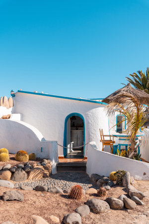 White walls, palm trees and blue sky, Canary Islands architecture