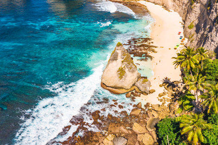 Aerial view of tropical Diamond Beach, Nusa Penida, Bali, Indonesia.の写真素材