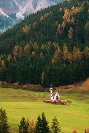 Autumn sunset in Val di Funes in the Italian Dolomites.の写真素材