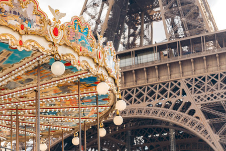 Carousel near Eiffel Tower, Paris. Fun, Parisian charm.の写真素材