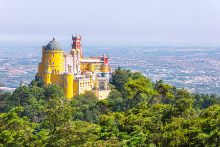 Pena Palace, a Romanticist castle in Sintra, Portugal, atop a forested hillの写真素材