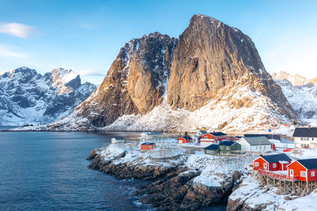 Scenic view of Hamnoy village in Lofoten, Norway, with mountains and red houses..の写真素材