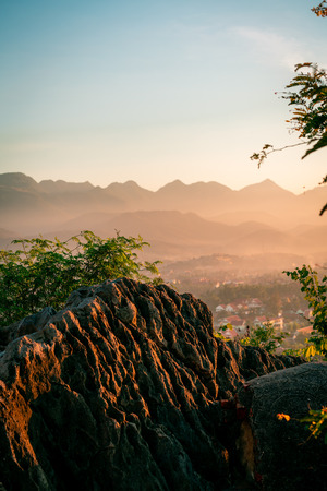 Sunset in Lunag Prabang, Laos. Beautiful clouds over the city. Mountains in the background. Amazing blue sky. Perfect condition.の写真素材
