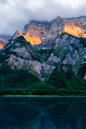 Amazing sunset at the fÃ¤hlensee in switzerland. Beautiful reflection on the lakeの写真素材