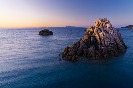 Most beautiful island in Europe. Clearest water in the Mediterranean Sea. Costa Paradiso. Amazing sunset with epic colorsの写真素材