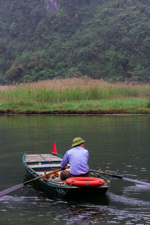Beautiful landscape with rocks and rice fields in Ninh Binh and Tam Coc in Vietnamの写真素材