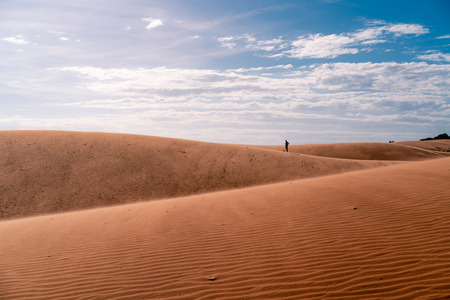 The red sand dunes in Mui ne, Vietnam is popular travel destination with long coastline.の写真素材