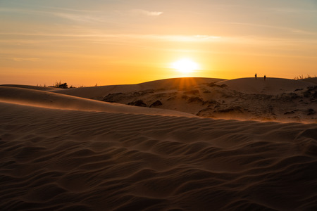 The red sand dunes in Mui ne, Vietnam is popular travel destination with long coastline.の写真素材