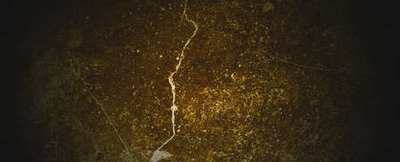 Shabby dark yellow concrete wall. Dark brown wall concrete or cementの写真素材