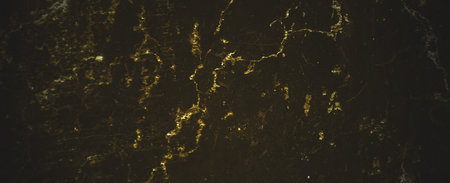 Shabby dark yellow concrete wall. Dark brown wall concrete or cementの写真素材