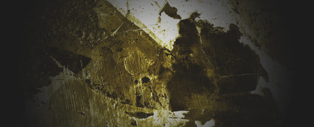 Shabby dark yellow concrete wall. Dark brown wall concrete or cementの写真素材