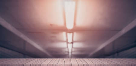 Empty light wood table top on blurred backgroundの写真素材