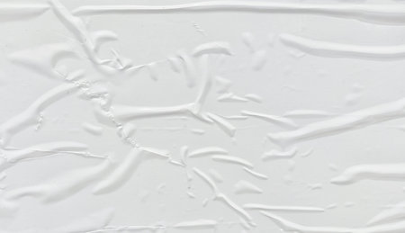 Crumpled paper texture background for various purposes. White wrinkled paper texture