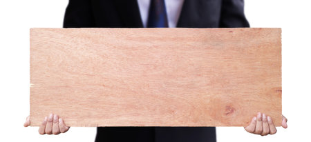 Male hand holding wooden bulletin board
