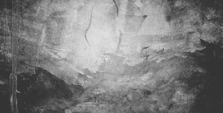 Black grainy stone texture backgroundor dark gray textured background.