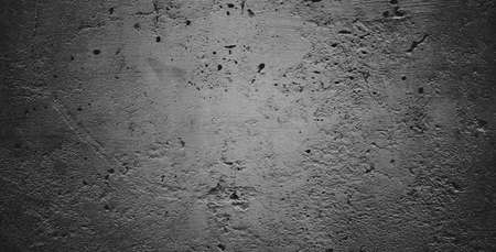 Black grainy stone texture backgroundor dark gray textured background.の写真素材