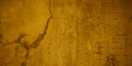 Gold texture for background. Yellow grunge wallの写真素材