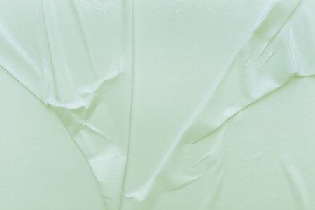 Blank green paper is crumpled texture background. Crumpled paper texture backgrounds for various...