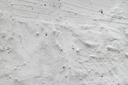 White plastered wall background texture cement dirty gray with abstract grey color design are light with white background.の写真素材