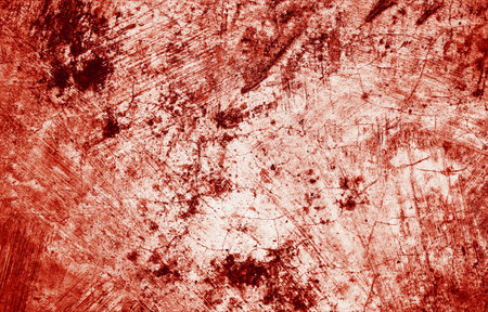 Splatters of red paint resemble fresh blood, their jagged edges contributing to a sense of unease. The stains, reminiscent of Halloween horrors.の写真素材