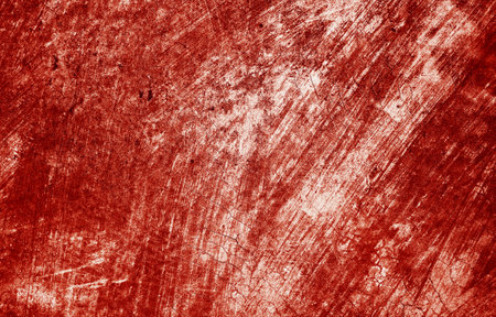 Splatters of red paint resemble fresh blood, their jagged edges contributing to a sense of unease. The stains, reminiscent of Halloween horrors.の写真素材