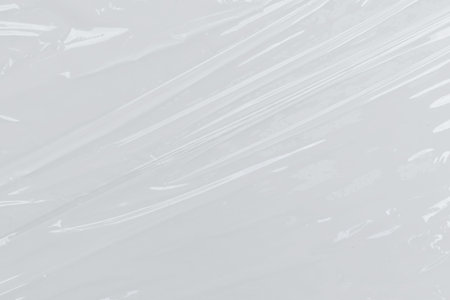 White plastic wrinkled or polyethylene bag texture, macro, white background