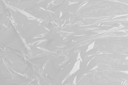 White plastic or polyethylene bag texture, Transparant wrinkled plastic, macro, white background