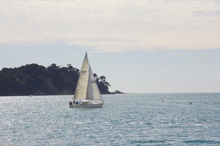 Sailboat on the sea with blue skyの写真素材