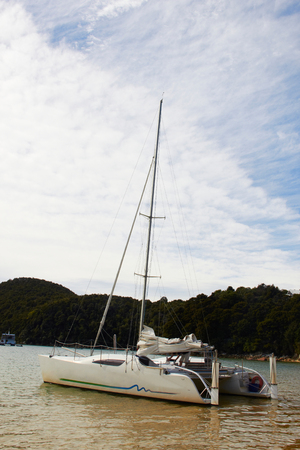 Sailboat on the sea with blue skyの写真素材