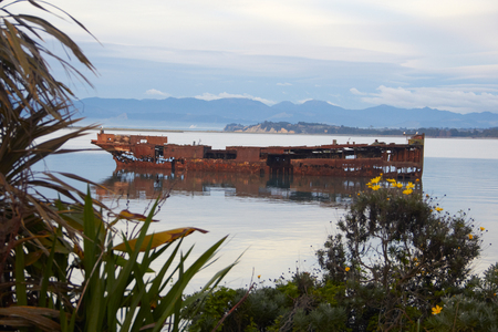 Abandoned ship in the coast of Port Motuekaの写真素材