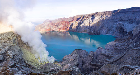 Ijen crater emits smoke from sulfur minesの写真素材