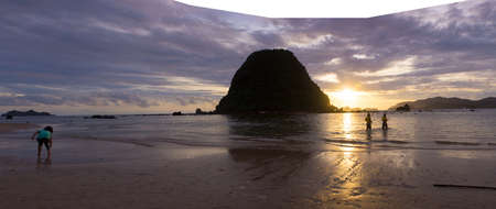 Panoramic view of the beach at sunsetの写真素材