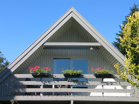 Traditional triangle shape Scandinavian Danish houseの写真素材