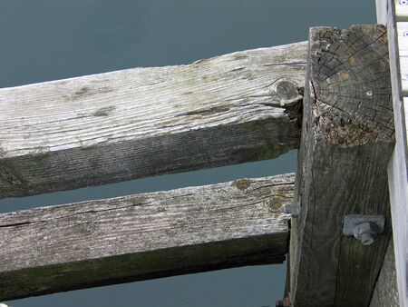 Close up details of parts of a wooden dockの写真素材