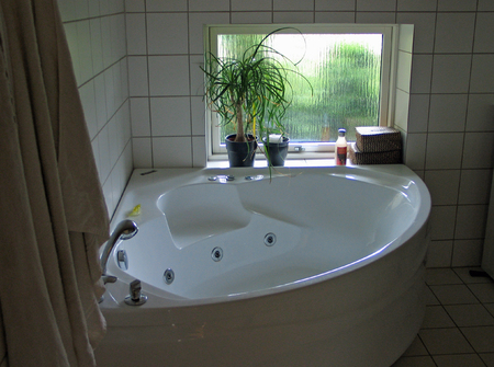Bathtub bathtub in a modern design batroom の写真素材